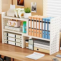 Home Office Perforated Shelf With Colored Binders Potted Plant Books Drawers And Coffee Cup