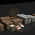 Stacked Cardboard Boxes With Metal Birdcage And Wooden Crates On Dark Surface