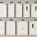 Modern White Double Doors with Glass Panels Handles and Green Exit Signs Collection