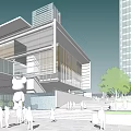 Modern Commercial Complex with Glass Facade Evening Lighting Green Trees and Street Cars