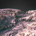 Detailed View Of Rugged Planetary Surface With Mountainous Terrain And Deep Canyons