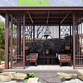 Traditional Chinese Wooden Pavilion Garden With Lattice Structure Stone Decorations Benches And Lanterns