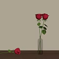 Red Roses In Transparent Glass Vase With Fallen Rose On Wooden Table
