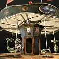 Vintage Carousel Ride With Decorative Canopy And Seahorse Shaped Seats