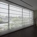 Large White Light Filtering Blinds In Bright Interior With Wooden Floor And Decorative Plant