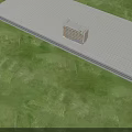 Modern Multi Storey Industrial Factory Building Exterior With Numerous Windows And Green Lawn