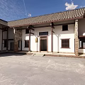 Traditional Chinese Architectural Entrance With Wooden Pillars Stone Steps And Plaque