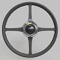 Classic Car Steering Wheel With Textured Grip And Metallic Center Spokes