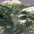 Rugged Mountain Valley Landscape With Flowing River And Green Brown Slopes