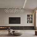 Modern Dining and Living Area With White Cabinets Marble Countertop Green Plants And Chandeliers