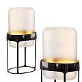 Modern Floor Lamps With Frosted Glass Shades Black Metal Stands And Warm Light
