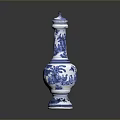 Carved Blue And White Vase Sculpture With Intricate Floral Patterns And Decorative Details