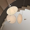 Three Circular Pendant Lights with White Shades Hang from Curved Ceiling in Modern Interior Design