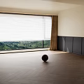 Herringbone Wooden Floor in Bright Room with Large Window Blinds Brown Curtains Black Cabinets and Green Landscape