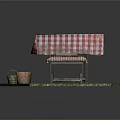 Outdoor Grass Setting With Red White Checkered Table Bench And Fruit Baskets