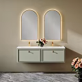 Elegant Modern Bathroom Vanity With Double Arched Backlit Mirrors Gold Faucets And Floral Decor