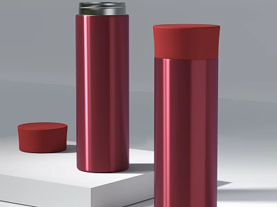Red Metal Insulated Cups With Removable Lids Displayed On White Platform 3d model