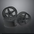 Three Silver Alloy Car Wheels Stacked As High Quality Automotive Parts