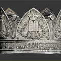 Ornate Silver Crown Sculptural Carving With Intricate Leaf Motifs And Inscription Details