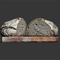 Freshly Baked Rustic Bread Loaf on Wooden Cutting Board with Flour Dust