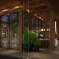 Traditional Chinese Garden Landscape With Wooden Structure Glass Windows And Green Plants In Dining Area