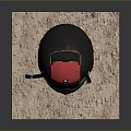 Red And Black Tactical Weapon With Silver Reflective Parts On Stone Platform
