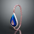 Elegant Rose Gold Bracelet With Chain Design And Blue Teardrop Gemstone Diamond Inlay