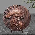 Brass Circular Rooster Head Carving Decorative Ornament on Stand with Marble Countertop and Green Plant