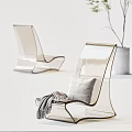 Modern Transparent Acrylic Lounge Chair With White Cushion And Gray Throw Blanket Minimalist Interior Setting