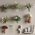 Various Decorative Flower Vases With White Red Blooms And Green Foliage