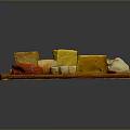 Assorted Cheese Platter With Various Shapes Colors On Wooden Board Including Ham Slices