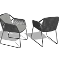 Two Modern Leisure Chairs With Wicker Design Metal Frame And Gray Cushion