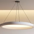 Modern Circular White Chandelier With Black Hanging Wires And Soft Lighting