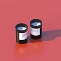 Stylish Household Candles In Black Containers With White Wax On Red Background