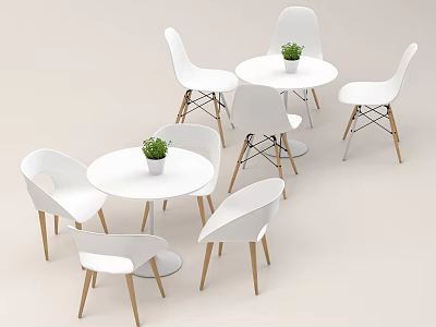 White Round Dining Table And Chairs Set With Wooden Legs And Small Plant 3d model