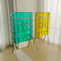 Yellow Display Shelf with Transparent Drawers Holding Small Toys and Metal Frame Indoor