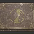 Vintage Hardcover Book with Brown Cover Gold Decorations Circular Emblem and Elegant Design