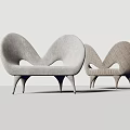 Modern Unique Curved Sofa with Ergonomic Shape and Hollow Details in Textured Fabric