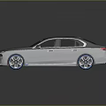 Silver Gray Luxury Sedan With White Roof Blue Accent Wheels And Modern Design