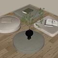 Light Colored Padded Round Low Tables With Books Transparent Vase Green Plants On Wooden Floor