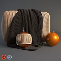 Beige And Dark Brown Knitted Sofa Stool With Dark Knitted Blanket And Orange Decor
