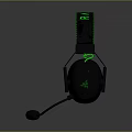Computer Gaming Headphones With Black Ear Cups Green Headband And Microphone