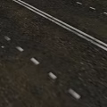 Road Infrastructure With Asphalt Pavement White Traffic Lane Markings And Dividers