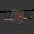 Vintage Biplane Model With Camouflage Wings Red Propeller And Tail