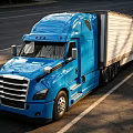 Blue Modern Semi Truck Front View With White Trailer Parked On Roadside
