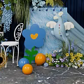 Decorative Photo Check In Spot With Clouds Photo Frames Colorful Balloons Greenery And Wooden Horse