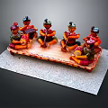 Group Of Traditional Costume Figurines Sitting On Wooden Platform Playing Instruments And Resting