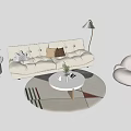 White Cushioned Sofa and Coffee Table Set with Round Geometric Rug Armchair and Floor Lamp