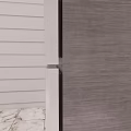Silver Refrigerator Freezer In Room With Light Striped Walls And Marble Floor Featuring Small Logo