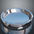 Silver Metal Ashtray Round Design With Grooved Edges And Smooth Reflective Surface